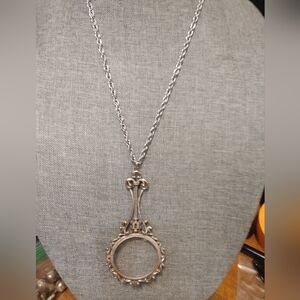 Vintage Silvertone Magnifying Glass Pendant On Silver tone Chain. Hangs Down 17"